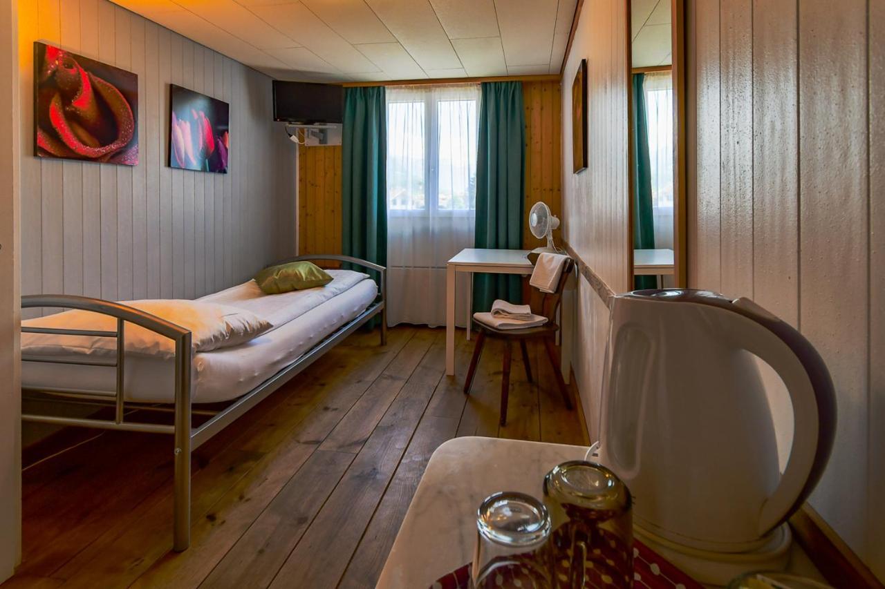 Hotel Tell And Apartments Unterseen Экстерьер фото