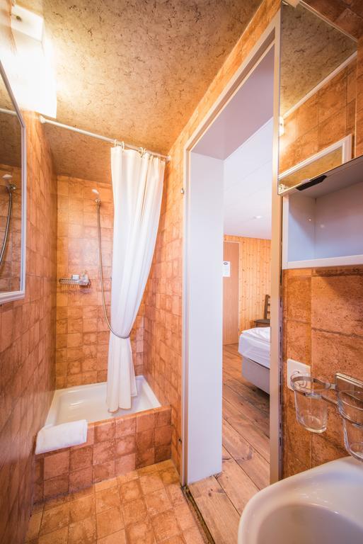 Hotel Tell And Apartments Unterseen Экстерьер фото